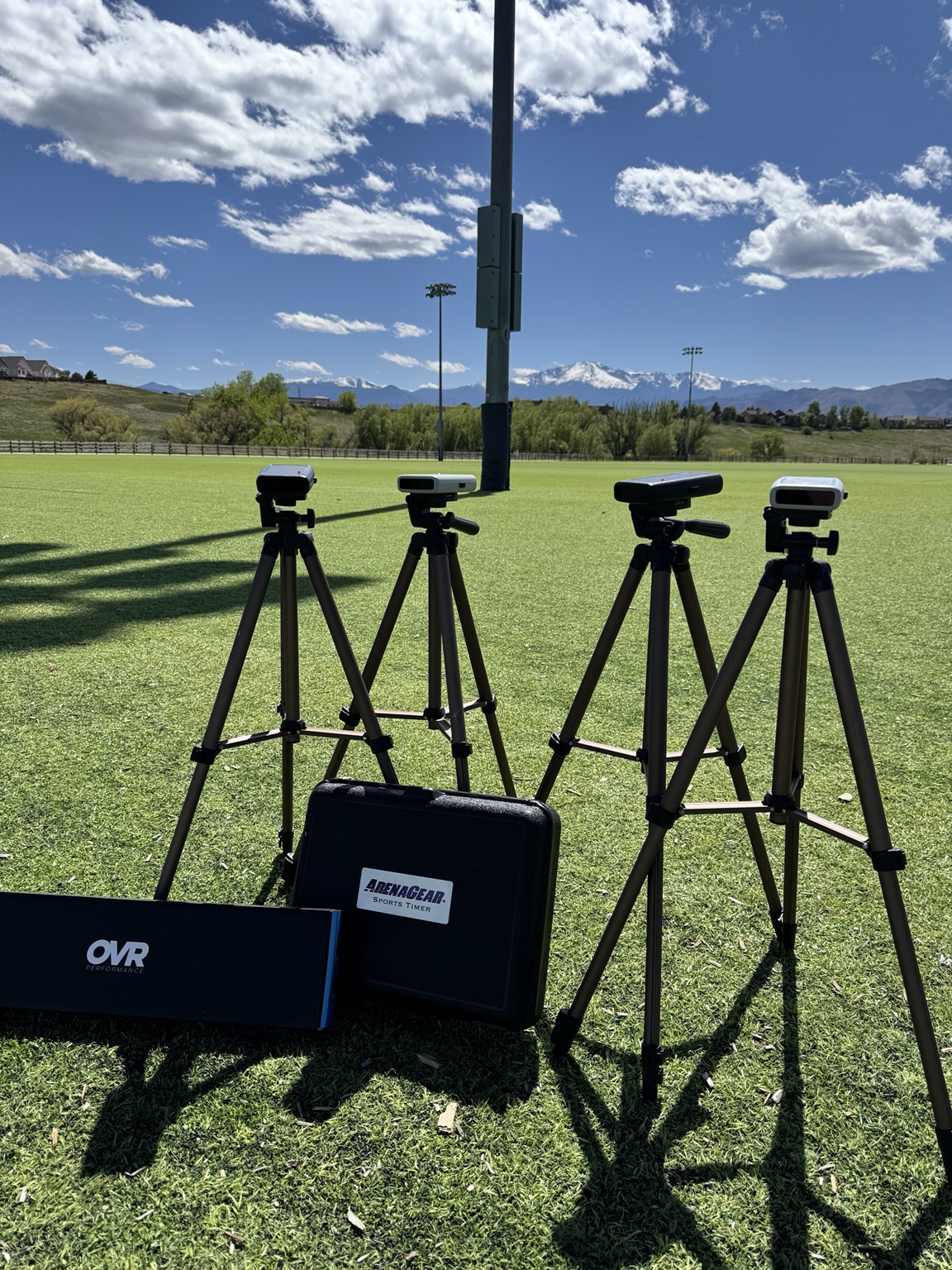 COR1 electronic timing gates set up on a Colorado Springs athletic field